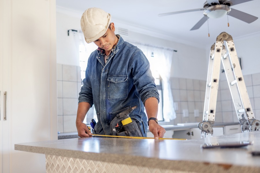 Home and Trade Services Business - Man Working Kitchen Remodeling